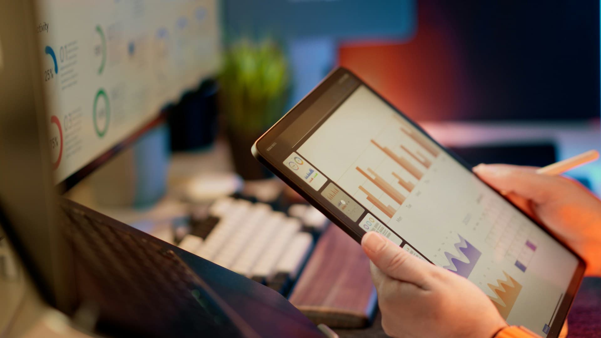 Professionals collaborating with technology in a modern business environment